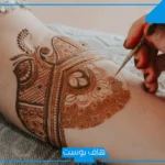 تفسير حلم نقش الحناء على اليد في المنام للفتاة العزباء